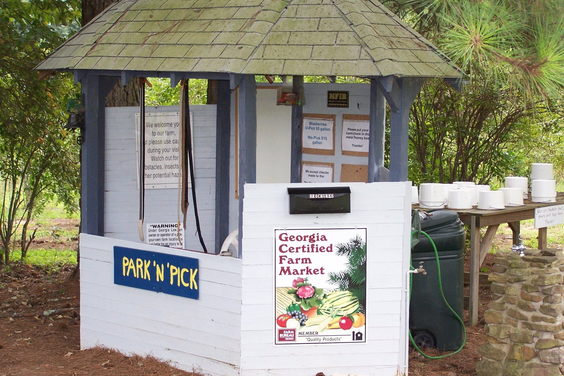 The Park 'n' Pick kiosk in 2005 with field buckets and visitor instructions